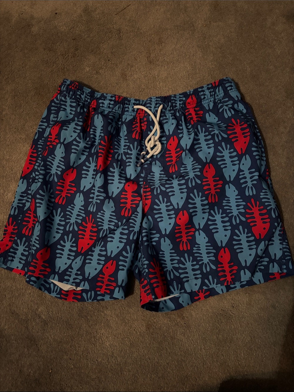 Men’s Southern Tide Navy Swim Trunks with Red & Light Blue Fish Pattern